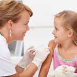 stock-photo-little-girl-getting-vaccinated-shot