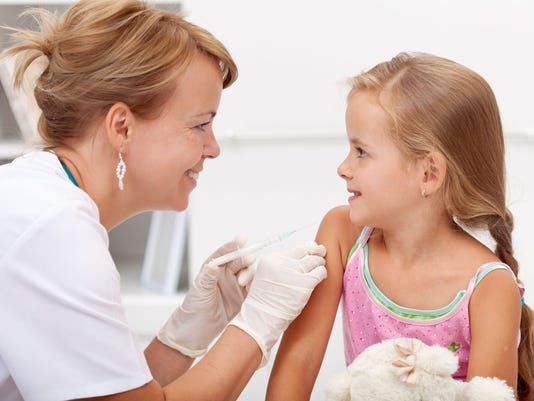 stock-photo-little-girl-getting-vaccinated-shot